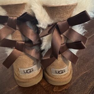 UGG Kids Tan Boots with Chocolate Ribbons